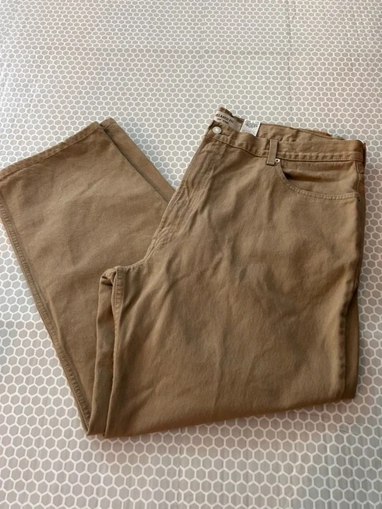 Levi's relaxed fit 550 jeans in khaki tan.  Size 44X30. Cotton