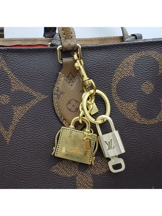 Authentic Louis Vuitton Lock & Key with Unbranded Golden Bag Charm, Keychain