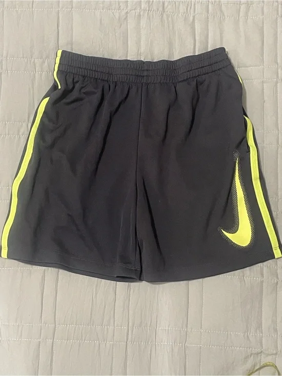 Nike Kids Black Athletic Shorts with Neon Yellow Swoosh