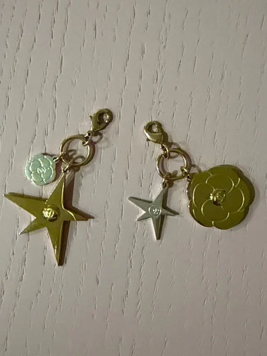 CHANEL Gold-Tone Star and Camellia Charm Pair