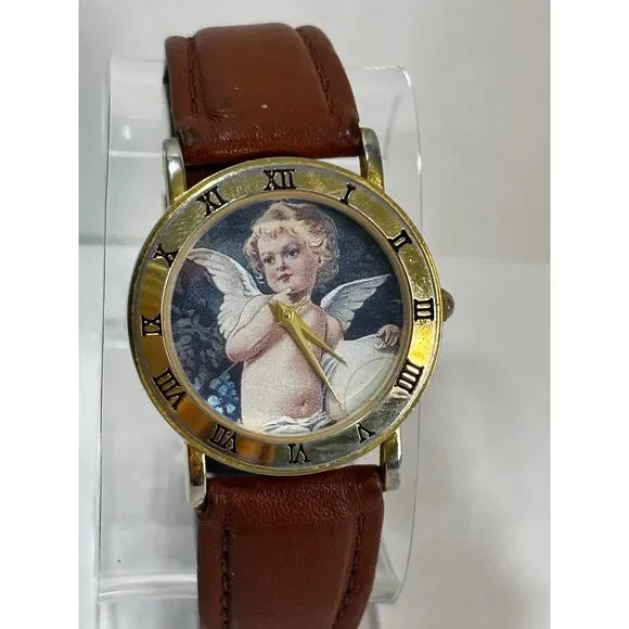 VTG Circa Angels Roman Numeral bezel gold-tone women's watch, working