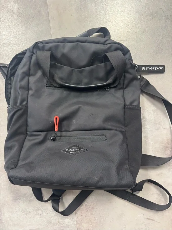 Sherpani Black Backpack with Red Zipper Pull