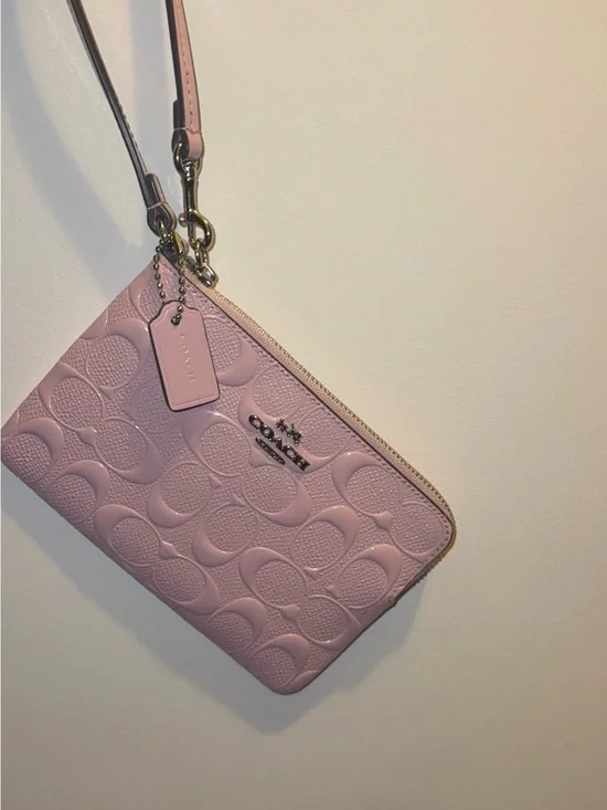 COACH Pink Signature Embossed Leather Wristlet
