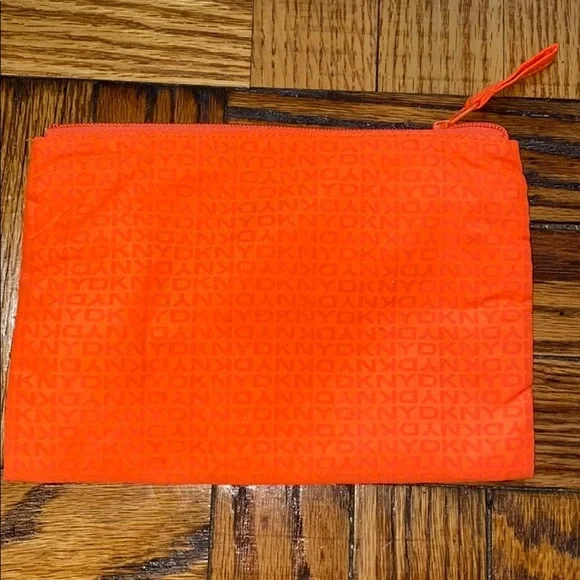 DKNY orange zippered pouch