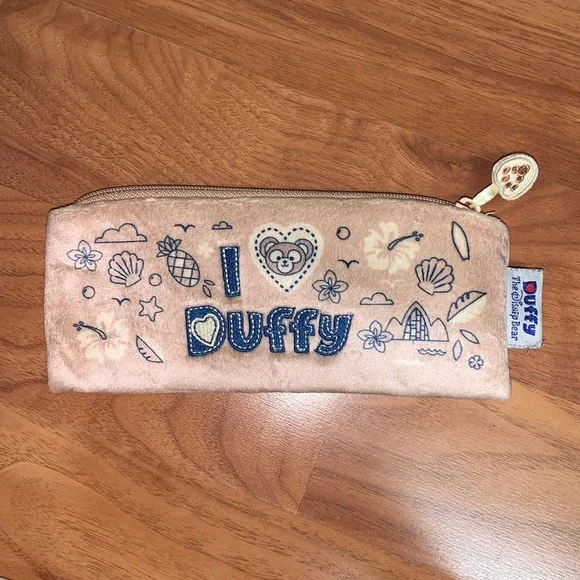 Disney “I 🤎 Duffy” Aulani Zippered Pouch