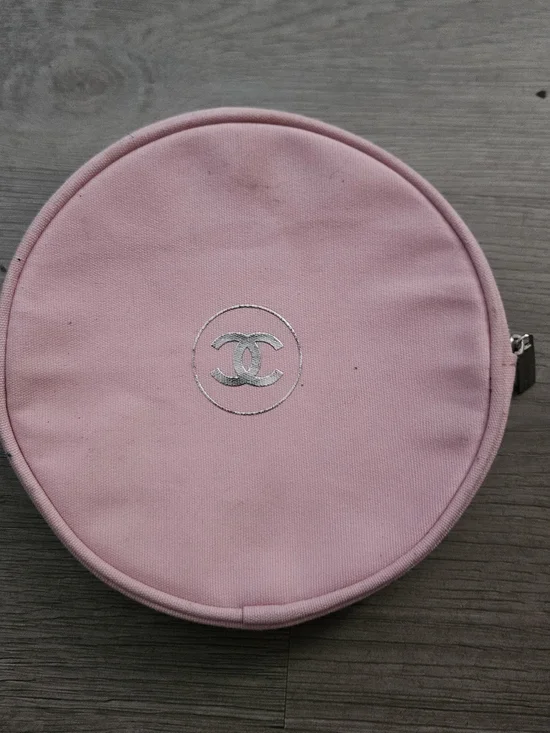 CHANEL Pink Round Cosmetic Case with Silver Logo