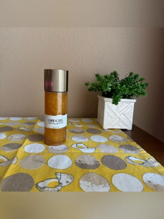 Carolina Herrera Good Girl Leg Elixer glittery gold body oil 3.4 oz