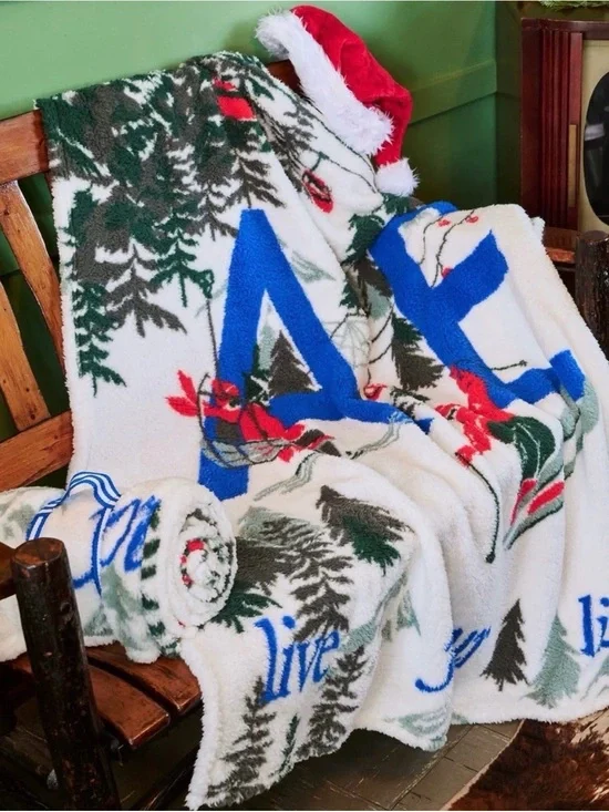 American Eagle Outfitters Holiday Plush Throw in White, Blue, Green & Red
