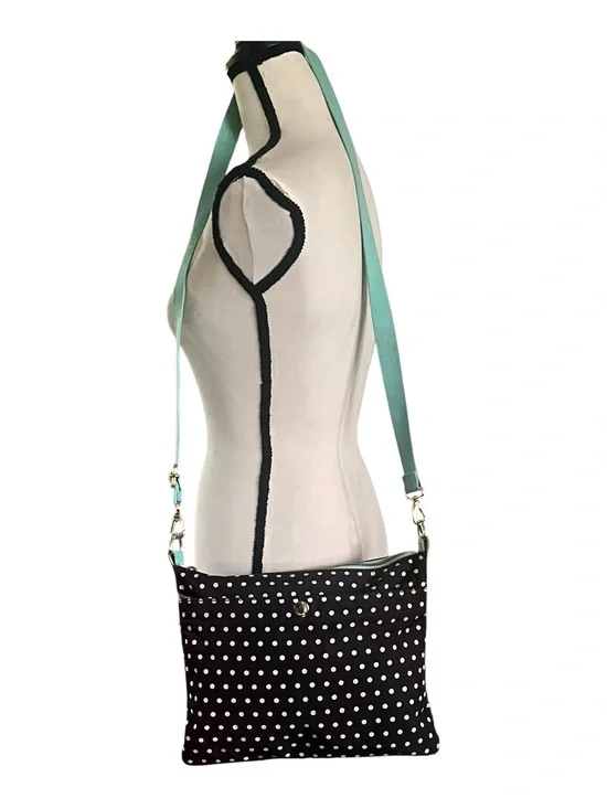 Fossil Keyper polka dot crossbody with mint aqua adjustable strap.