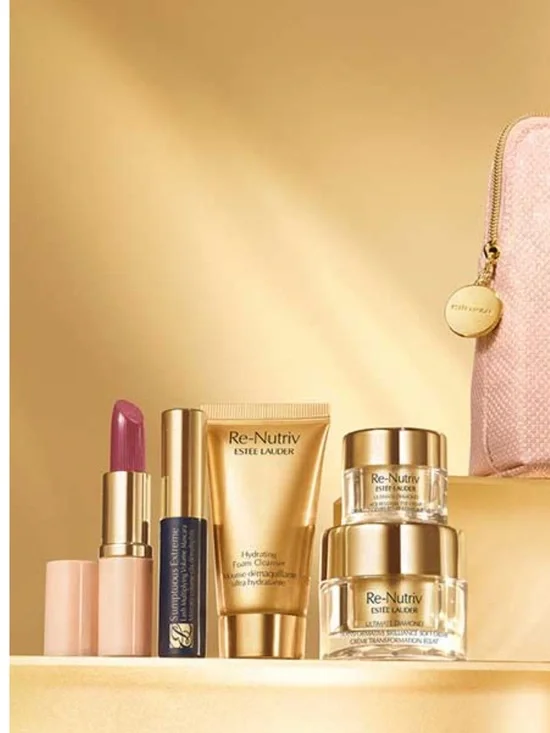 NWT ESTEE LAUDAR 5 piece gift set with pink shimmer cosmetics bag.