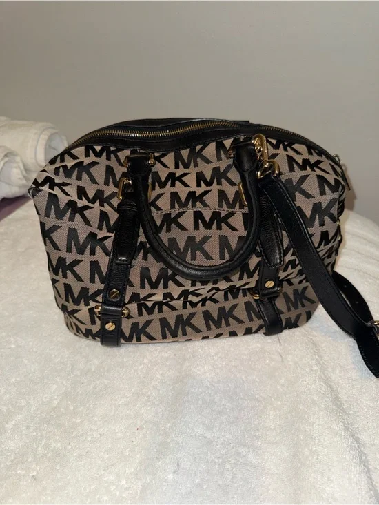 Michael Kors black duffle signature bag