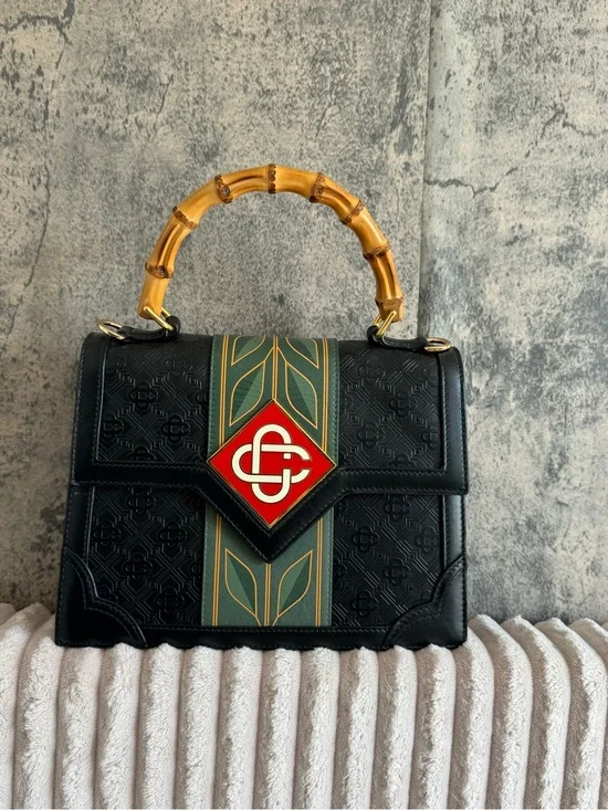 Black Satchel with Bamboo Top Handle and Green-Gold Stripe Accent