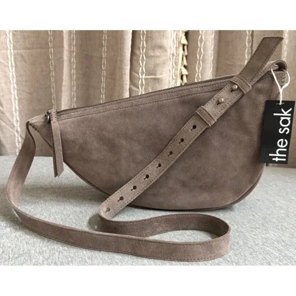 The Sak Suede Saddle Crossbody Bag in Taupe Brown