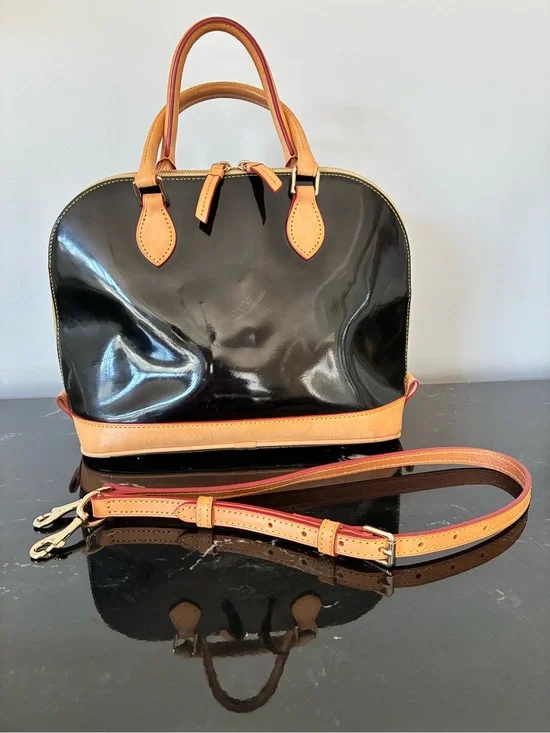 Dooney & Bourke Black Patent Satchel with Cream Trim and Red Accents