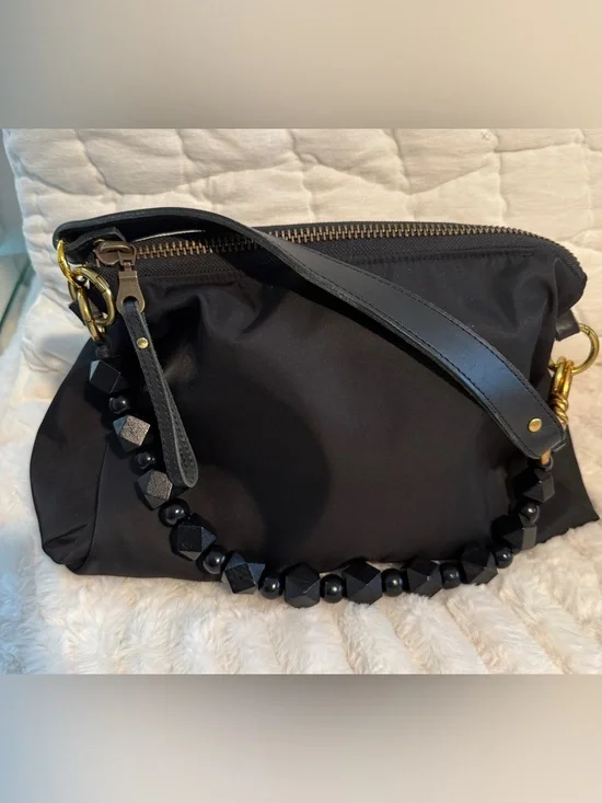 Black Women's Daily bag in nylon Shoulder Bag  with rings to add straps.