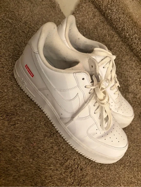 Nike White Low-Top Sneakers with Small Red Accent