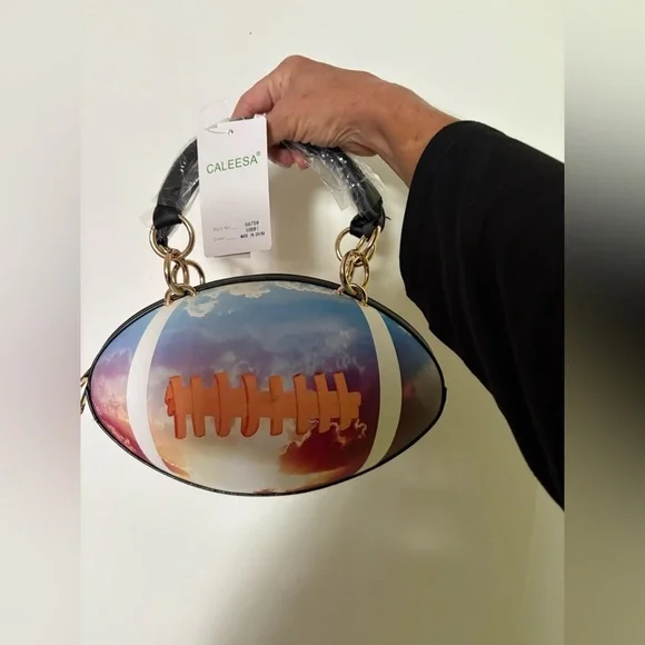NWT-whimsical tie-dyed clouds  Pristine pebbled Rugby football purse gold chain