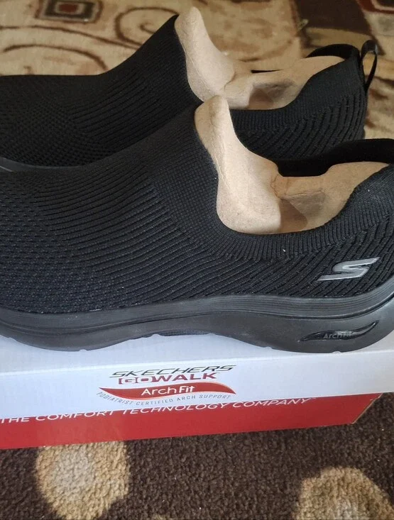 Skechers Arch Fit Slip-On Knit Sneakers in Black