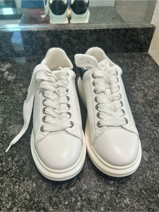 Steve Madden White Low-Top Platform Sneakers with Black Heel Accent