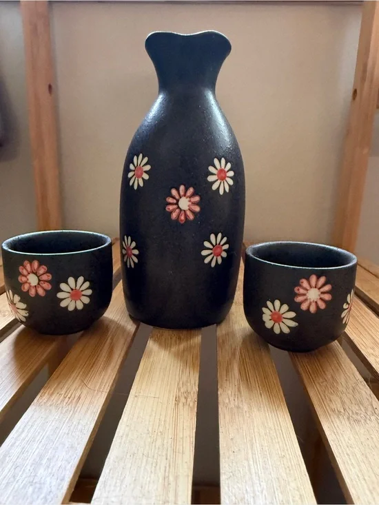 Black Ceramic Floral Sake Set with Pink and White Daisy Accents