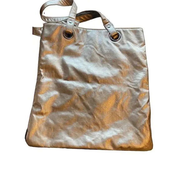 Gold faux leather shoulder bag new with out tags clean
