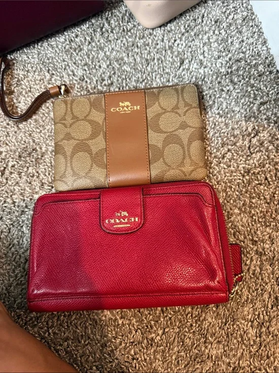 Two coach wristlets