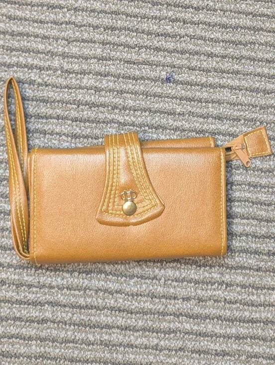 Vintage Tan Wristlet Wallet Rich cognac-tan wallet with wrist strap, snap closur