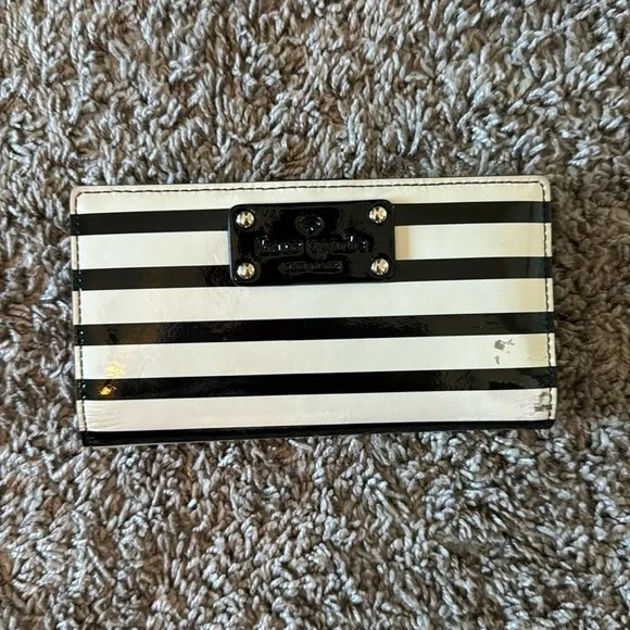 Striped black and white, shiny Kate Spade card wallet