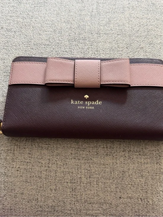 kate spade two-tone bow continental wallet in burgundy and blush