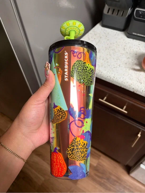 Starbucks Iridescent Tumbler with Neon Green Lid and Multi-Color Fruit Motifs