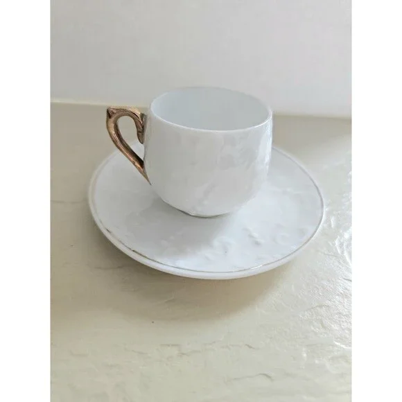 Vintage Miniature White Raised Design Cup And Saucer