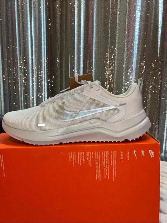 Nike Women's Light Gray Athletic Sneakers with Iridescent Swoosh