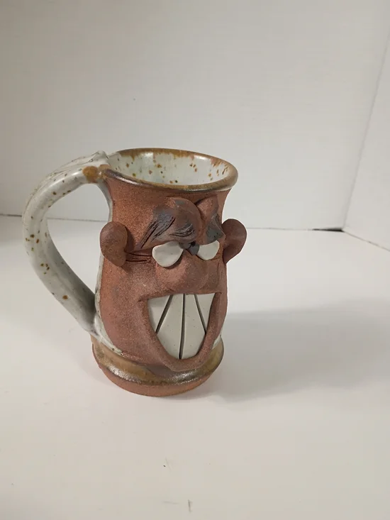 Hand Made pottery-crazy face mug-drunk confused or stoned dude