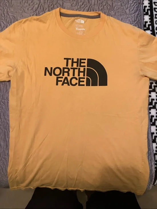 The North Face Men's Logo Tee in Mustard Yellow with Black Print
