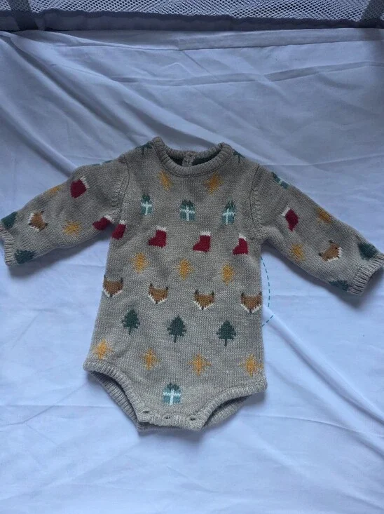Beige Knit Baby Bodysuit with Holiday Motifs