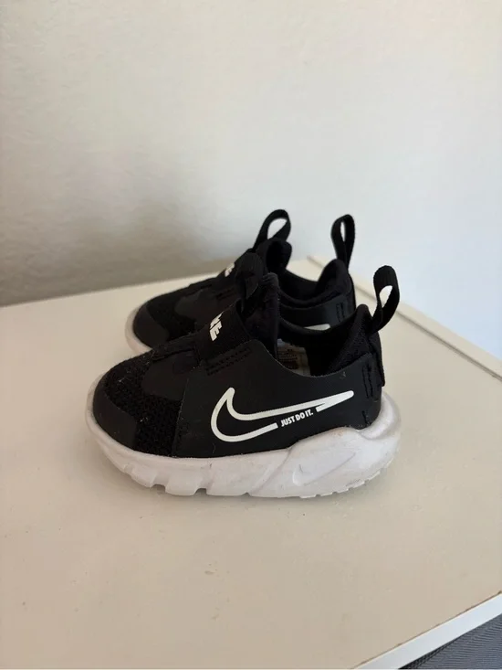 Nike Kids Black and White Swoosh Slip-On Sneakers
