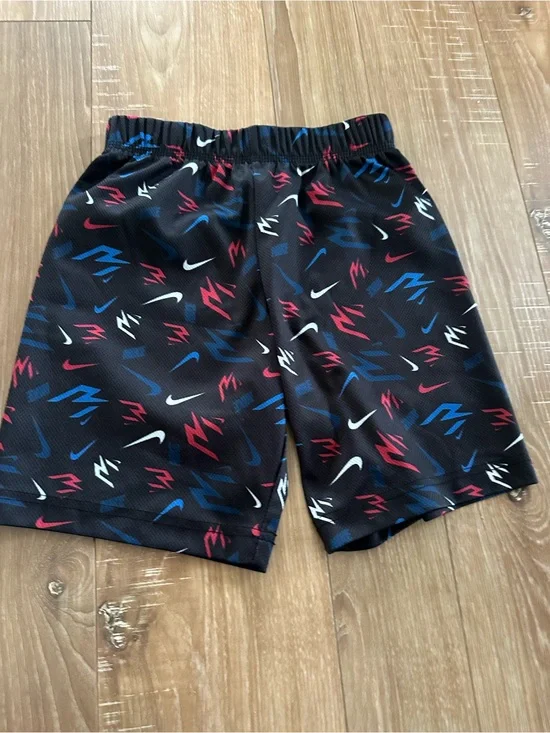 Nike Black Kids Athletic Shorts with Red, Blue & White Swoosh Print