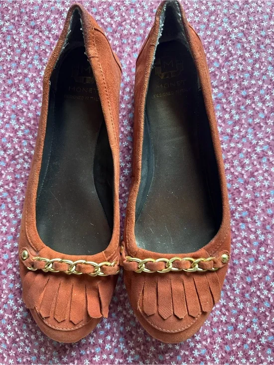 Monet Rust Suede Fringe Loafers with Gold Chain Accent