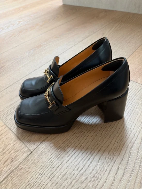 Tod's Black Leather Loafers with Gold Horsebit Detail