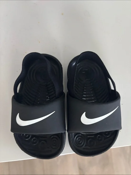 Nike Kids Black Slide Sandals with White Swoosh Accent