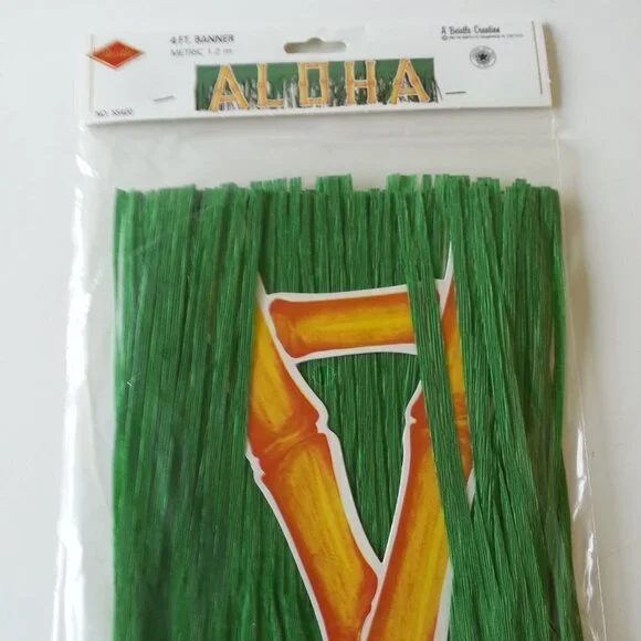 NWT -  Beistle Aloha Paper Banner Green grass with bamboo style lettering Hawaii