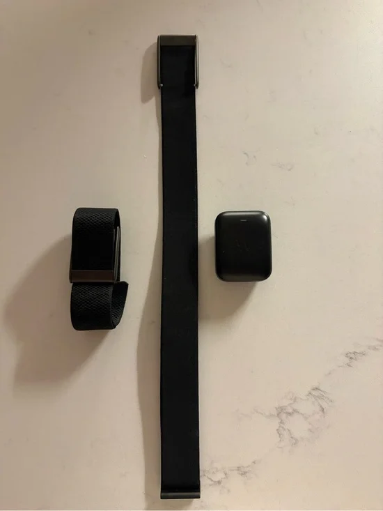 Whoop fitness tracker, bicep band and charger included