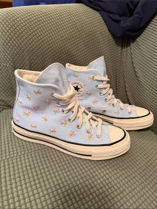Converse Chuck Taylor light blue with purple flowers.   Mens 4. Womens 6