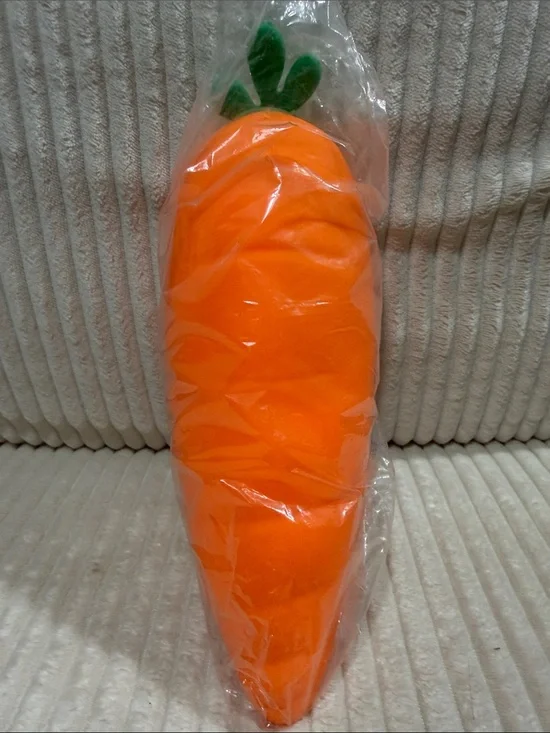 Large Carrot Squishy-New in packaging. No brand. Very soft-squishy. 9” tall.