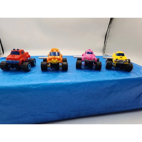 Vintage Style Wind Up Monster Truck Toy Car Lot Red Orange‎ Pink Yellow Set of 4