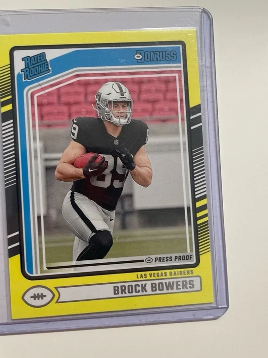 Panini Donruss Brock Bowers Card - Yellow press proof rated rookie