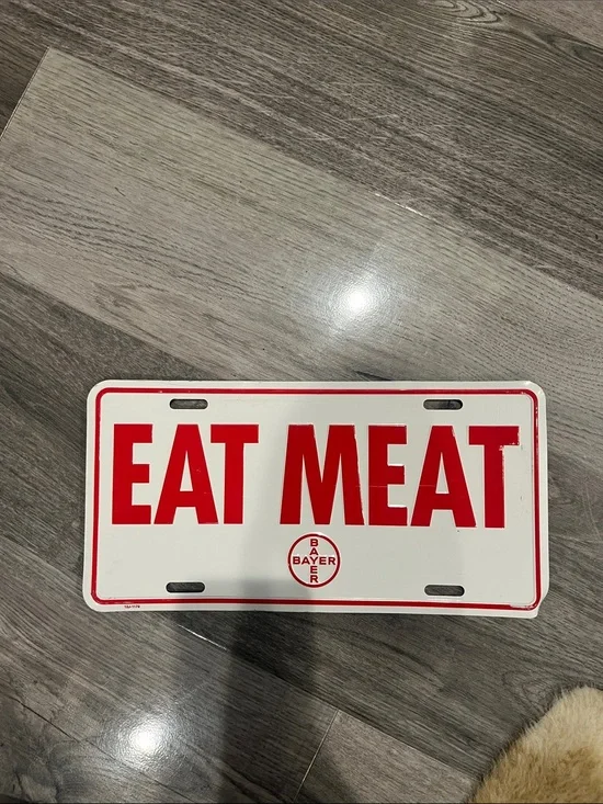 'EAT MEAT' Red & White Metal License Plate Sign