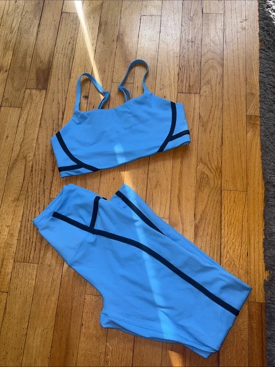 Nike Light Blue Sports Bra and Leggings Set with Dark Trim