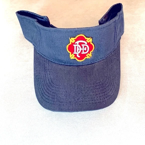 Men Blue cap with DFD fire Dept emblem. Visor hat