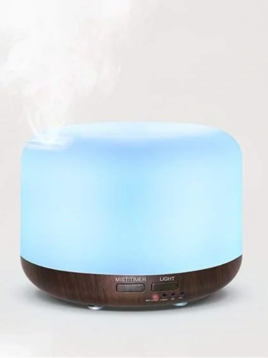 Essential oil diffuser with mist and light for aromatherapy